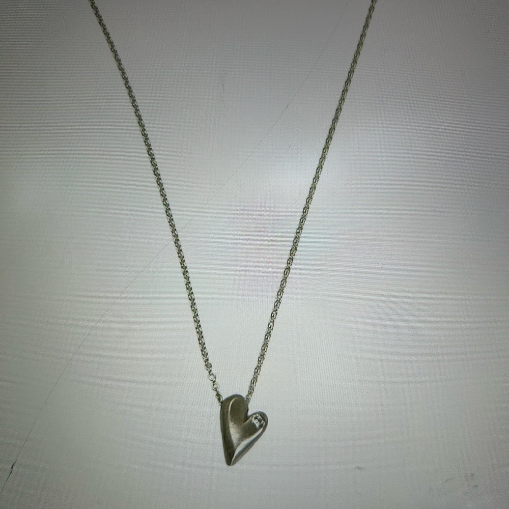 Philippe Robert’s Tiny Diamond Heart Necklace